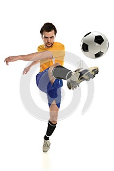 Soccer Player Kicking Ball