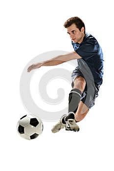 Soccer Player Kicking Ball