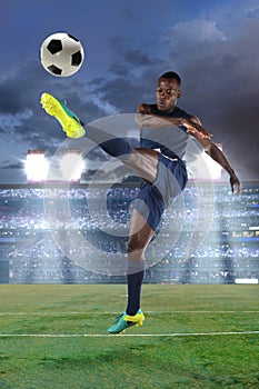 Soccer Player Kicking Ball