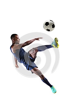 Soccer Player Kicking Ball