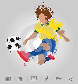 Soccer player kicks the ball with paint splatter design photo