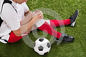 Soccer player with knee injury