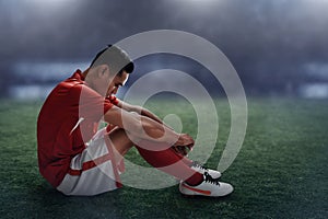 Soccer player losing the match