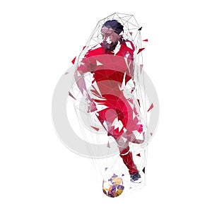 Soccer player in red jersey running with ball, front view. Geometric low poly vector illustration