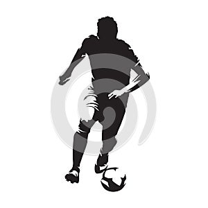 Soccer player running with ball, isolated vector silhouette, front view footballer