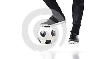 Soccer player stand on ball