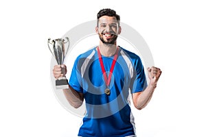 Soccer player with trophy cup and medal Isolated On White