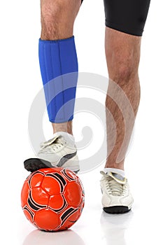 Soccer player wearing a neoprene brace