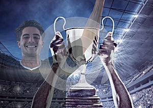 Soccer player wining the cup and two images are superimpose photo