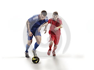 Soccer players in action on isolation with ball