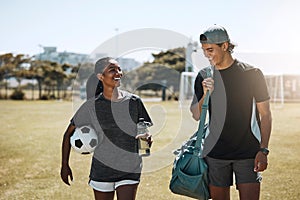 Soccer players, people or team walking after fitness, training and workout on grass field. Smile, happy and talking