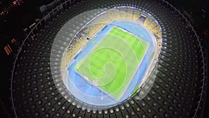 Soccer players on the stadium field, football match, aerial view