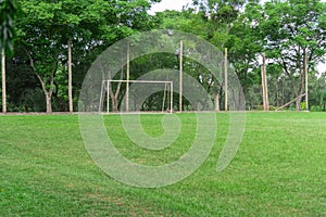 Soccer practice field in a club in southern Brazil and the goalkeeper`s post photo