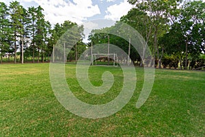 Soccer practice field in a club in southern Brazil and the goalkeeper`s post photo