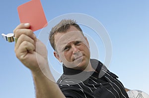 Soccer Referee Assigning Red Card