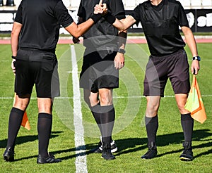 Soccer referees before the match