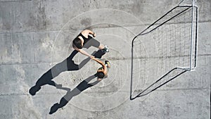 Soccer, sports and handshake with a man and woman athlete shaking hands after a game on a rooftop from above. Football