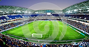 Soccer stadium arena with natural green grass