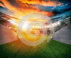 Soccer stadium seen by the exit of the locker room tunnel