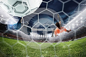 Soccer striker hits the ball with an acrobatic bicycle kick. 3D Rendering