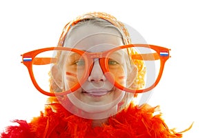 Soccer supporter with big orange glasses