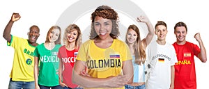 Soccer supporter from Colombia with fans from other countries