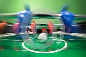 Soccer table game with red and blue players