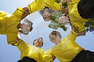 Soccer Team Forming Huddle photo