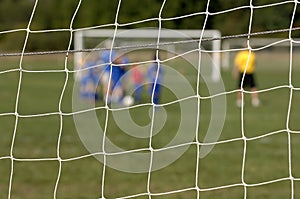 Soccer Team through net