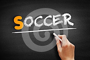 Soccer text on blackboard