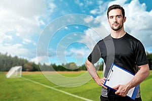 Soccer Trainer on a Soccer Field