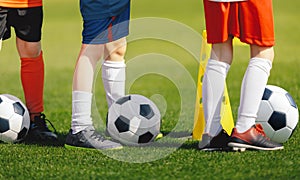 Soccer Training Class. Legs of Children on Football Lesson