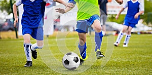 Soccer Training Match For Children Youth Teams. Young Boys Running on the Pitch