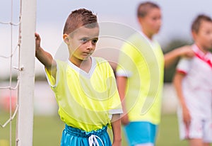 Socder player near the goal on the sports field