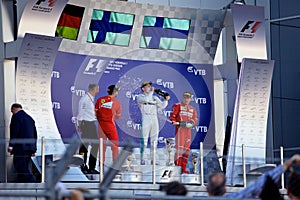 Top three finishers on the podium. Formula One. Sochi Russia.