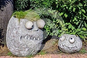 Sochi, Russia, August 13 -2022 Sochi-Park. Stone flowerbeds with funny expressions on sunny day