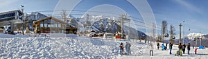 SOCHI, RUSSIA - JANUARY 3, 2018: Gondola lift on the background of snowy mountains. Rosa Khutor Resort