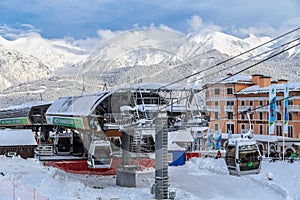 Sochi, Russia - January 9. 2015: 960 m cable way ski lift station in Gorky Gorod winter ski mountain resort. Scenic landscape