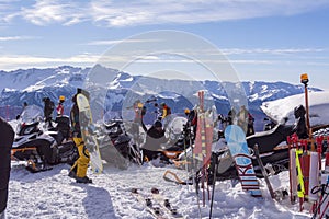 Sochi, Russia, 10-01-2018. Rosa Khutor ski resort. Camp at the top of the mountain, snowmobiles, snowboarders and skiers on Rose