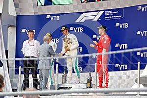 Top three finishers on the podium. Formula One. Sochi Russia.