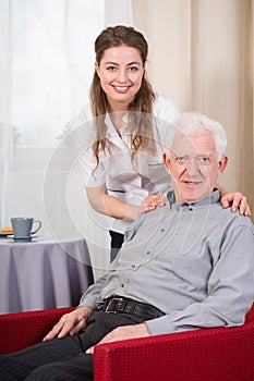 Social care worker and senior photo