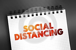 Social Distancing - measures to restrict when and where people can gather to stop the spread of infectious diseases, text concept