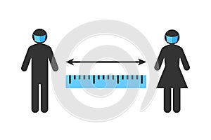 Social distancing sign with people wearing face masks and standing apart