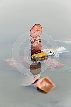 Social issue, Hindu God idols (Ganesh Laxmi) immersion in water