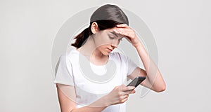 Social media anxiety troubled woman smartphone