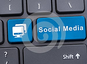 Social media on blue button on keyboard