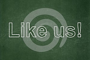 Social media concept: Like us! on chalkboard background