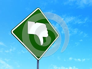 Social media concept: Thumb Down on road sign