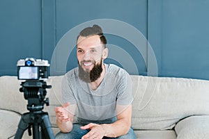 Social media influencer smiling man shoot video