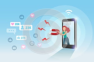 Social media marketing attraction, acquisition and retention strategy. Woman holding magnet on smart phone attracting people love